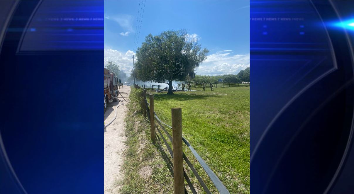 Authorities: 1 killed, 1 injured after small plane crashes into private