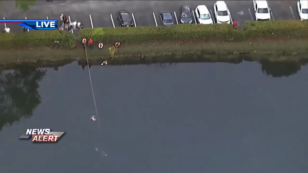 Rescue crews respond to submerged vehicle in Davie