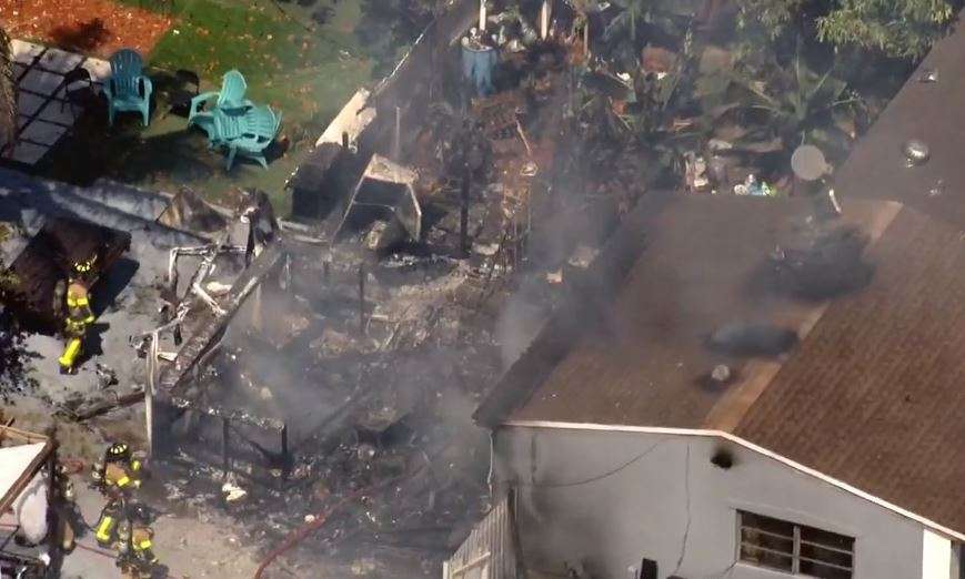 Crews work to put out house fire in Miami Gardens; residents evacuated ...