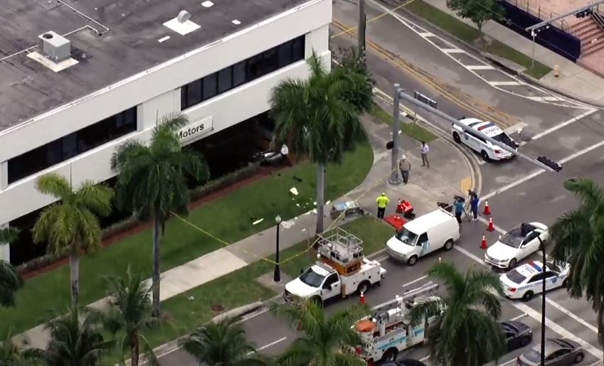 Vehicle strikes cyclist crashes into six vehicles and Braman Motors dealership Vehicle strikes cyclist crashes into six vehicles and Braman Motors dealership