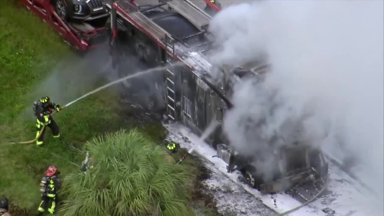 Car carrier catches on fire on Turnpike in Hollywood; NB lanes reopen