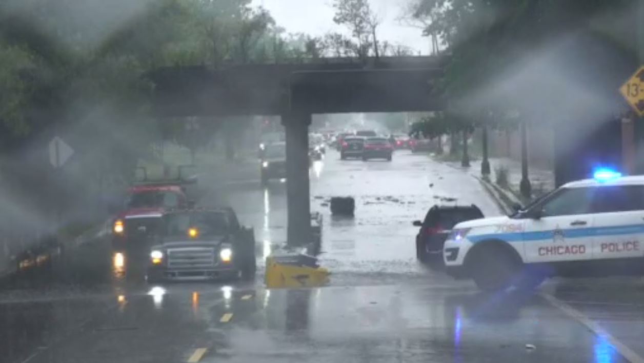 Heavy rains flood Chicago roads and force NASCAR to cut short a