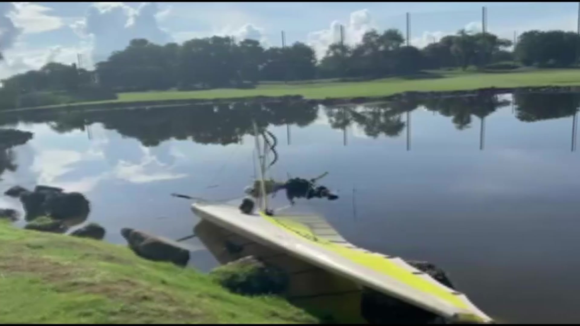 Glider crashlands in Coral Gables lake, two people escape with minor