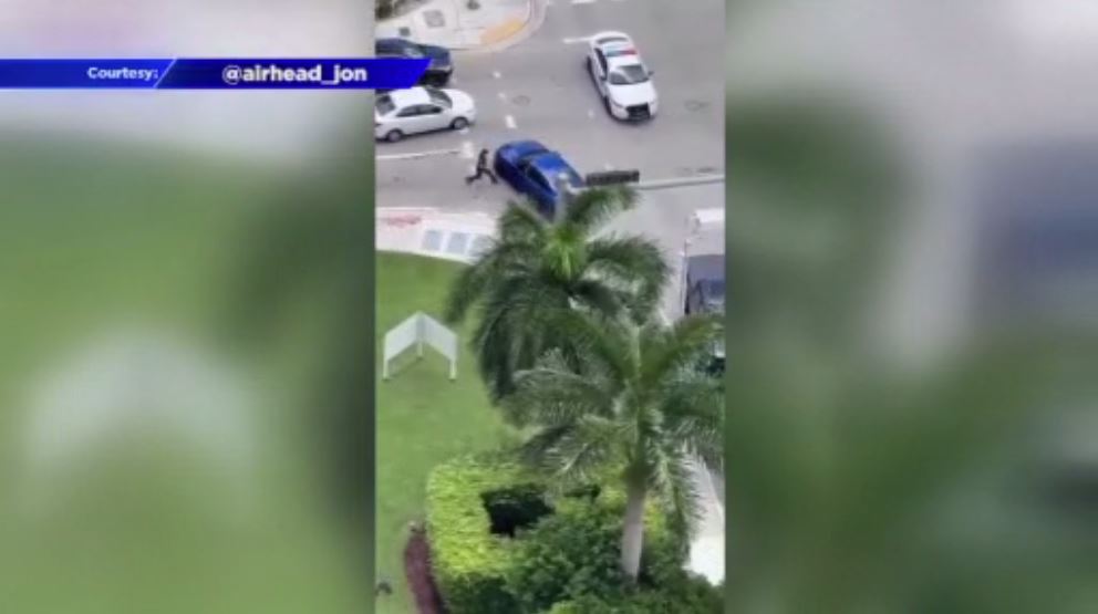 Video shows reckless driver nearly hitting Miami Police officer, striking cruiser in Brickell – WSVN 7News | Miami News, Weather, Sports