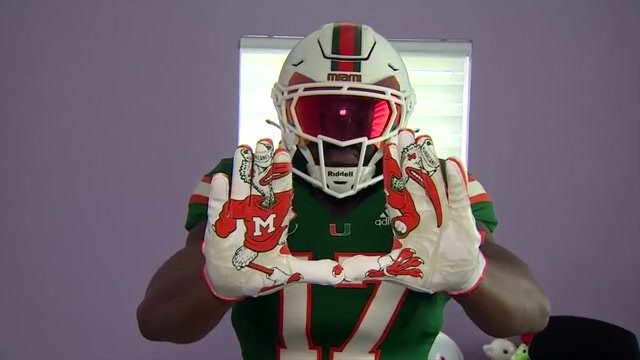 Miami fan who dresses in full uniform, pads honors his late brother