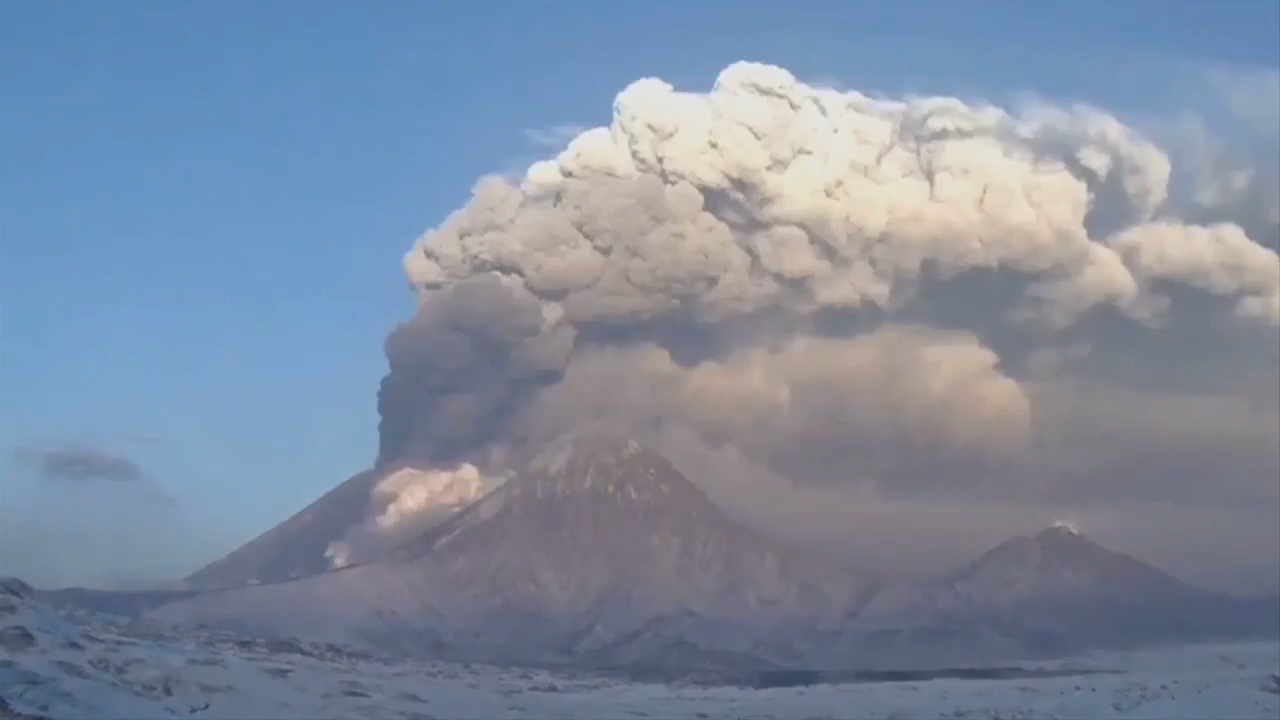 Eruption of Eurasia’s tallest active volcano sends ash columns above a