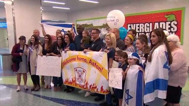 Plantation firefighter receives warm welcome at FLL after returning from serving in Israel amid war - WSVN 7News | Miami News, Weather, Sports - Vimarsana News