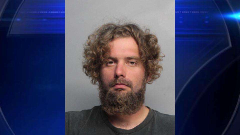 Homeless man arrested after fire crews find man dead inside truck at ...