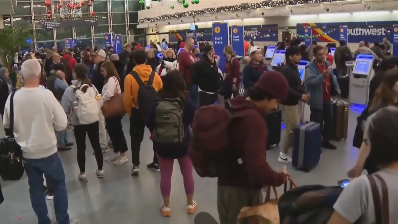 Hundreds of flights canceled after massive winter storm makes its way