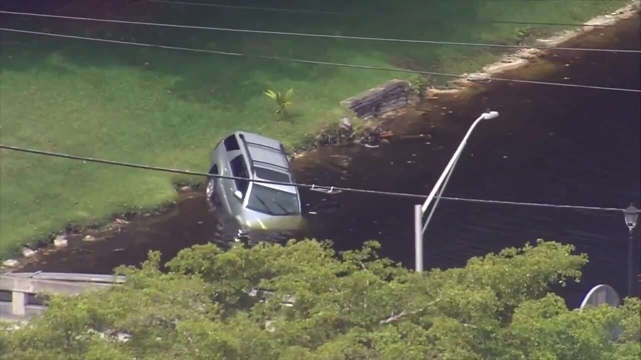 Driver OK after car crashes into canal in Miami Lakes - WSVN 7News ...