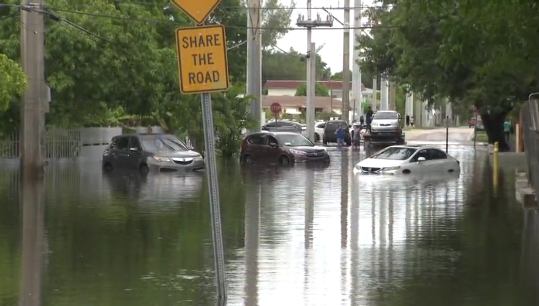 Tropical rainstorms in South Florida lead to flight delays and streets ...