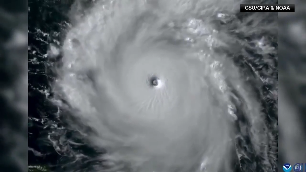 Hurricane Isaac and Tropical Storm Joyce move through the open Atlantic