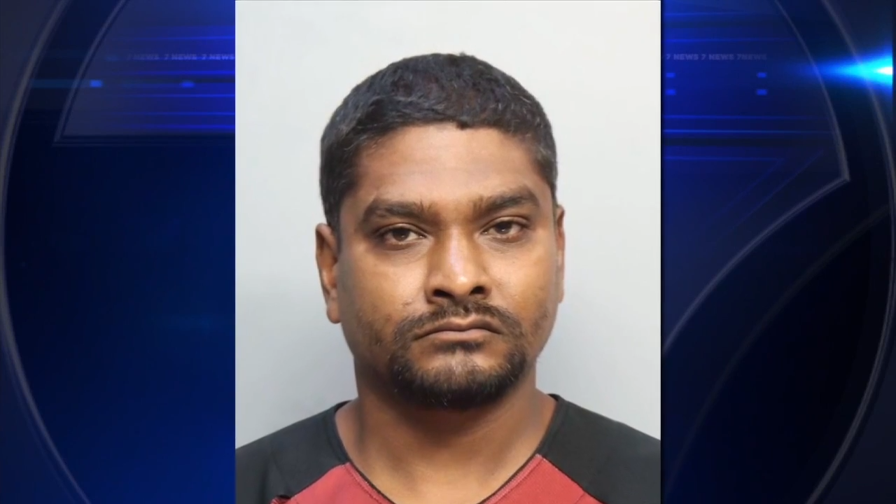 Man arrested after being found sitting inside sports car in Miami Beach ...