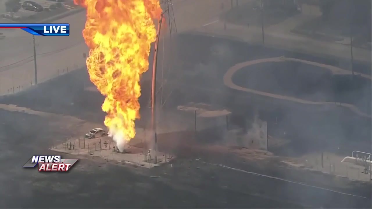 A pipeline has exploded and is on fire in a Houston suburb, forcing
