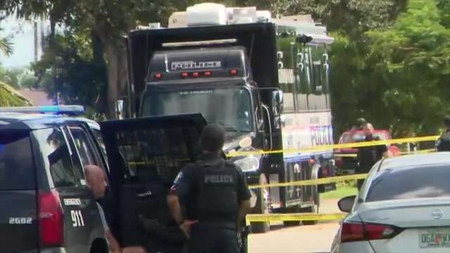 1 dead, officer injured after confrontation during neighbor dispute in ...