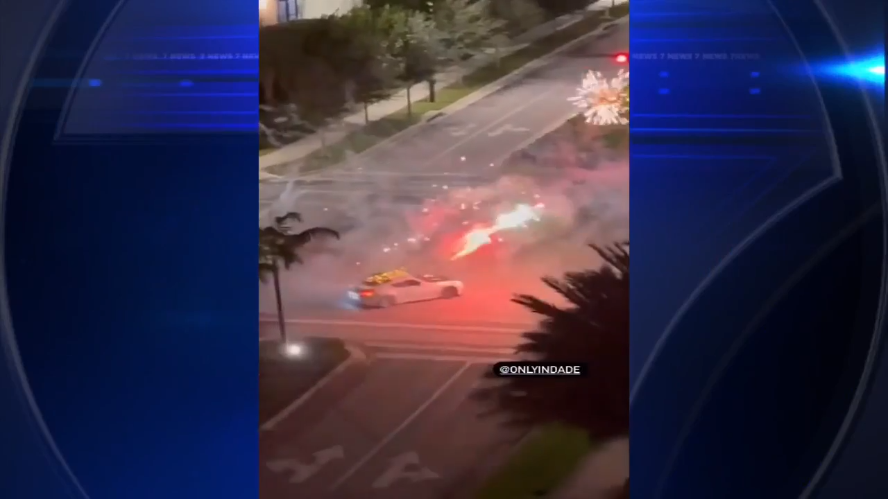 Driver caught on cellphone video doing doughnuts in middle of ...