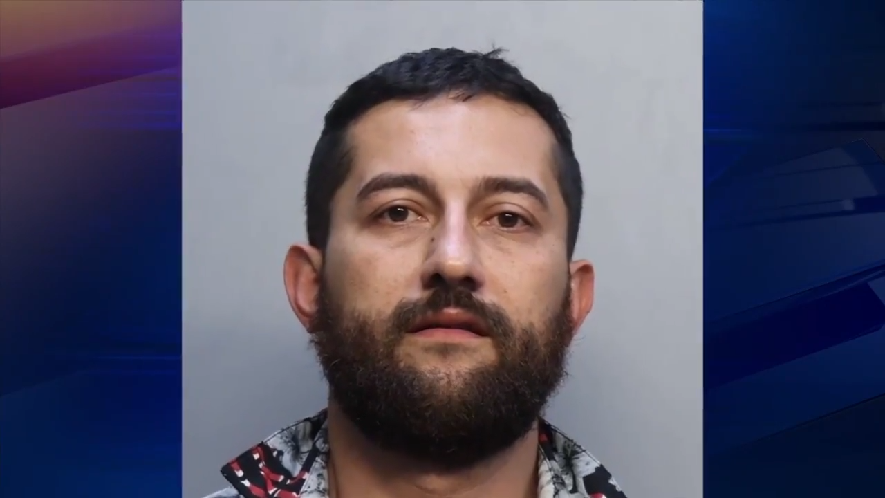 Driver arrested after he tried to get towed truck back from South Beach ...