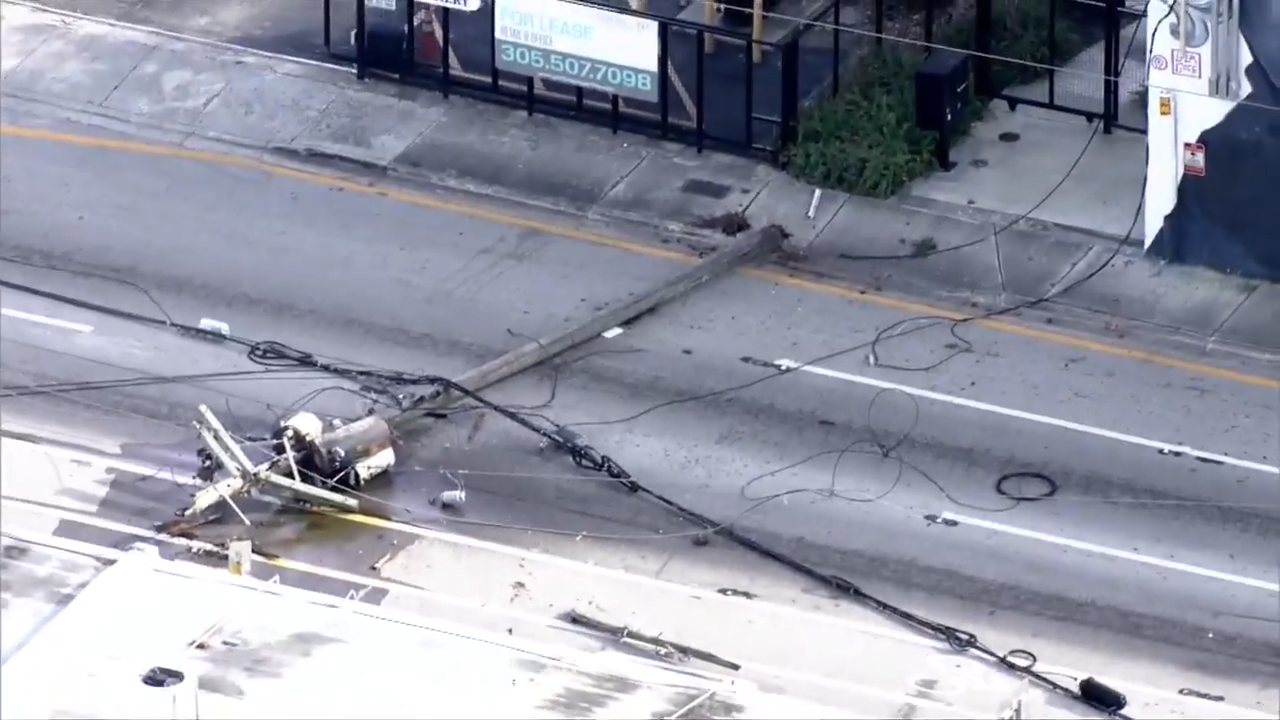 Dump truck snags power lines in Miami, causing poles to come down; NE ...