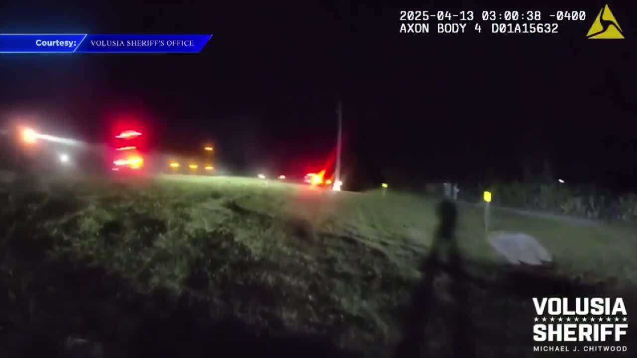 Body camera video shows Volusia County deputies nearly struck by SUV on ...