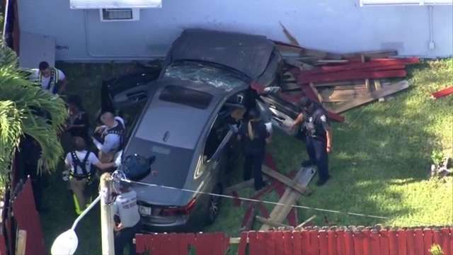 Woman hospitalized after car crashes into fence, hits North Miami Beach ...
