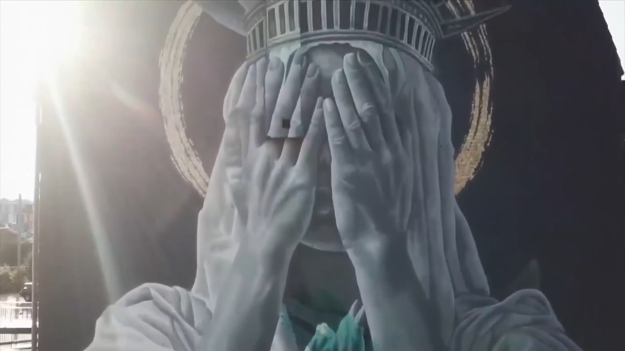 A new mural in France shows the Statue of Liberty covering her eyes in ...