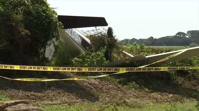 2 crawl out from small plane that landed upside down in New Smyrna ...