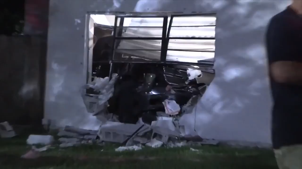 Driver hospitalized after crashing truck into townhome in West Miami-Dade