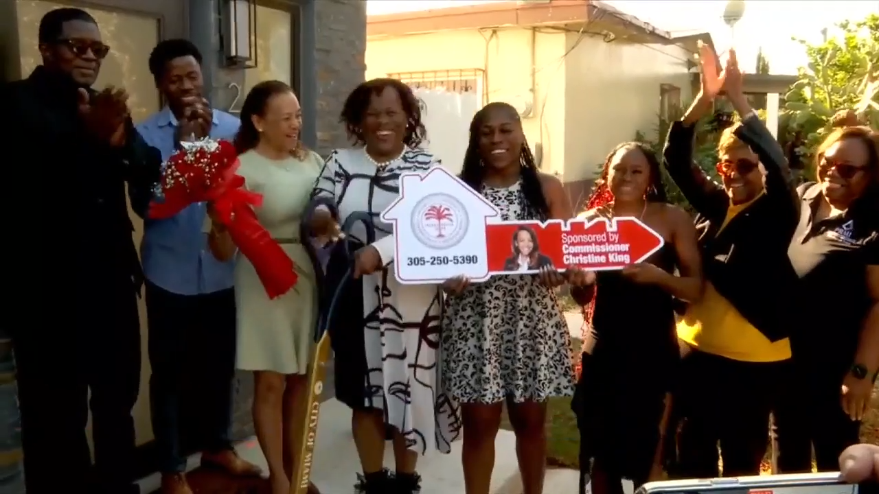 South Florida families cut the ribbon on new homes as part of affordable housing program
