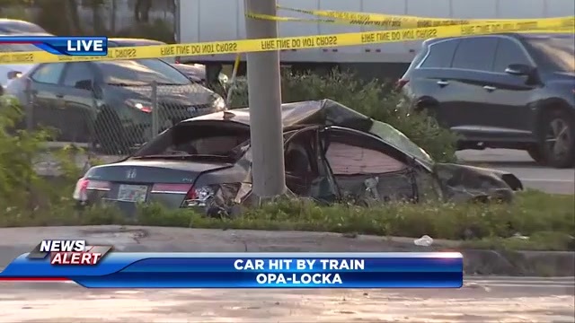 Train hits car stuck in traffic in Opa-locka; 2 passengers escape unharmed