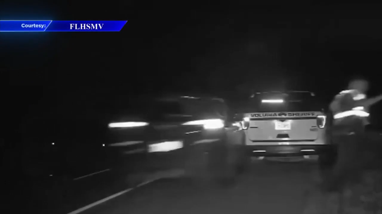 FHP trooper, deputy jump to safety after driver loses control and drives toward them on I-95