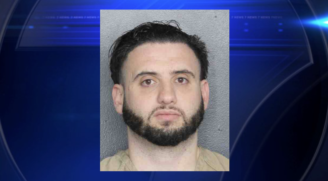 BSO deputy arrested for giving cell phone to inmate, police say