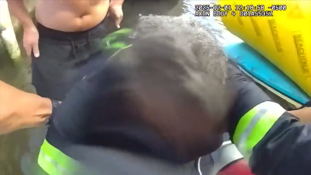 Bodycam video shows officer, good Samaritan rescuing driver from pickup truck after crashing into Miami River