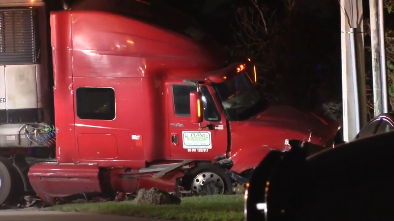 Crews clean up fuel leak after tractor-trailer collides with car in SW Miami-Dade