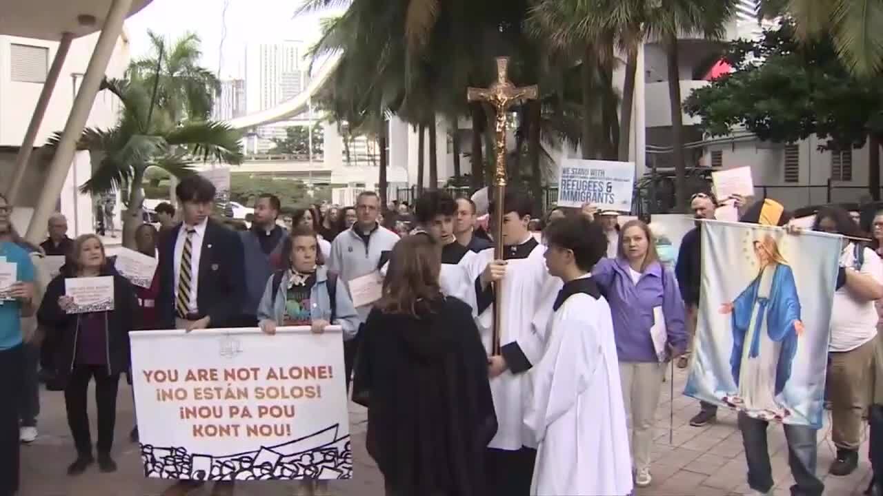 Catholic institutions, members of the community march toward Miami immigration court to pray, show support for migrants