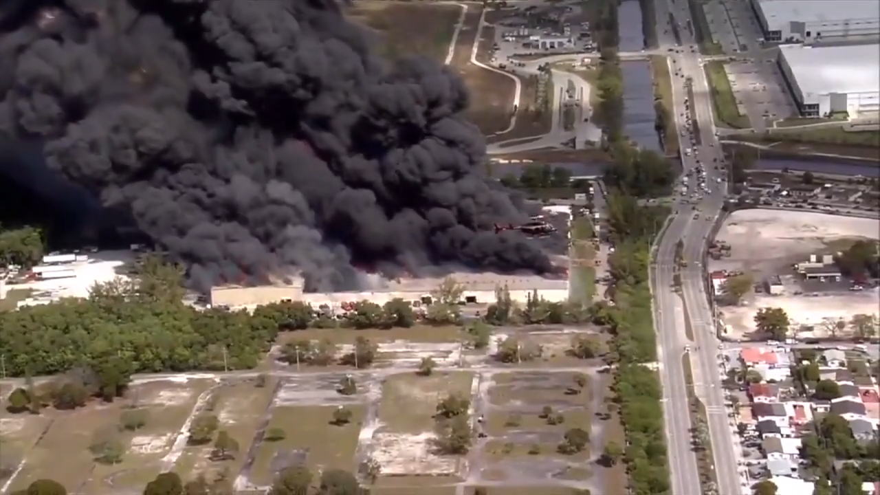 Crews battling 5-alarm warehouse fire near Turnpike in NW Miami-Dade ...