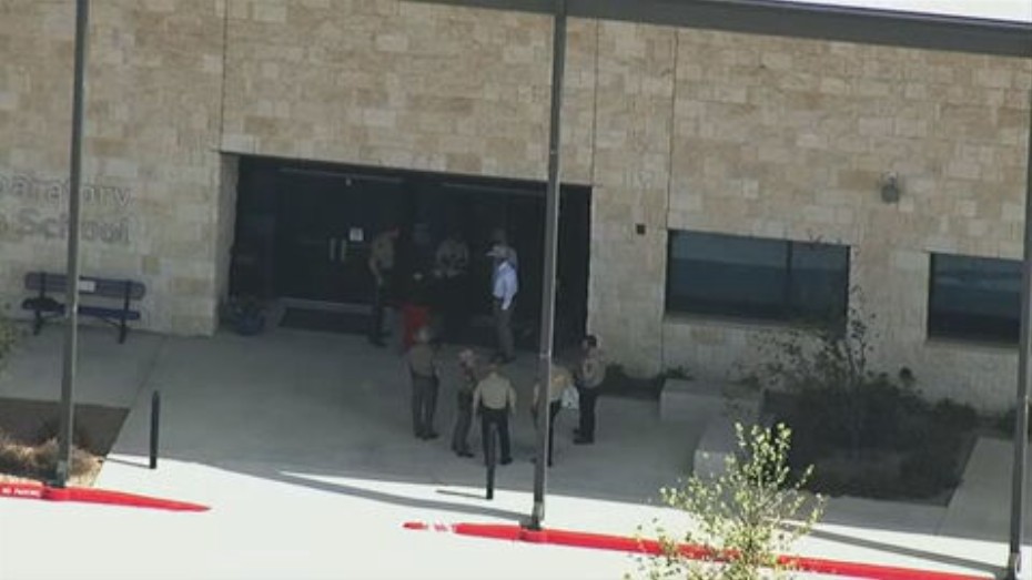 Student shoots a teacher and then fatally shoots himself at a Texas high school, authorities say