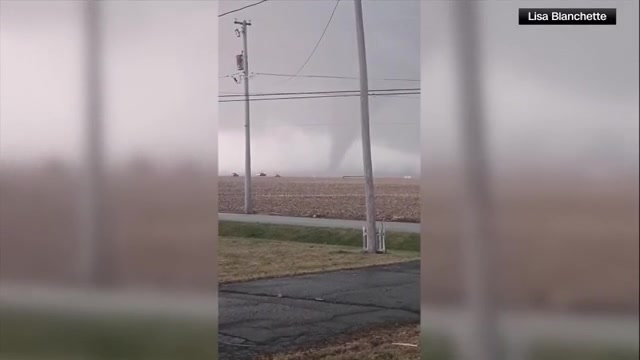 Severe storms whip up tornadoes in Illinois and Indiana, leveling homes