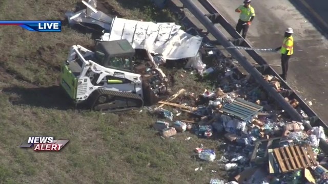 1 hospitalized after dump truck hits box truck on Sawgrass Expressway in Tamarac