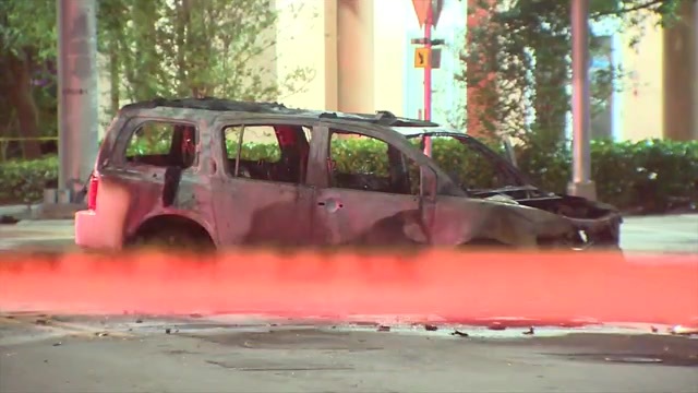 Driver rushed to hospital with burns after hitting pole in Liberty City, sparking fire