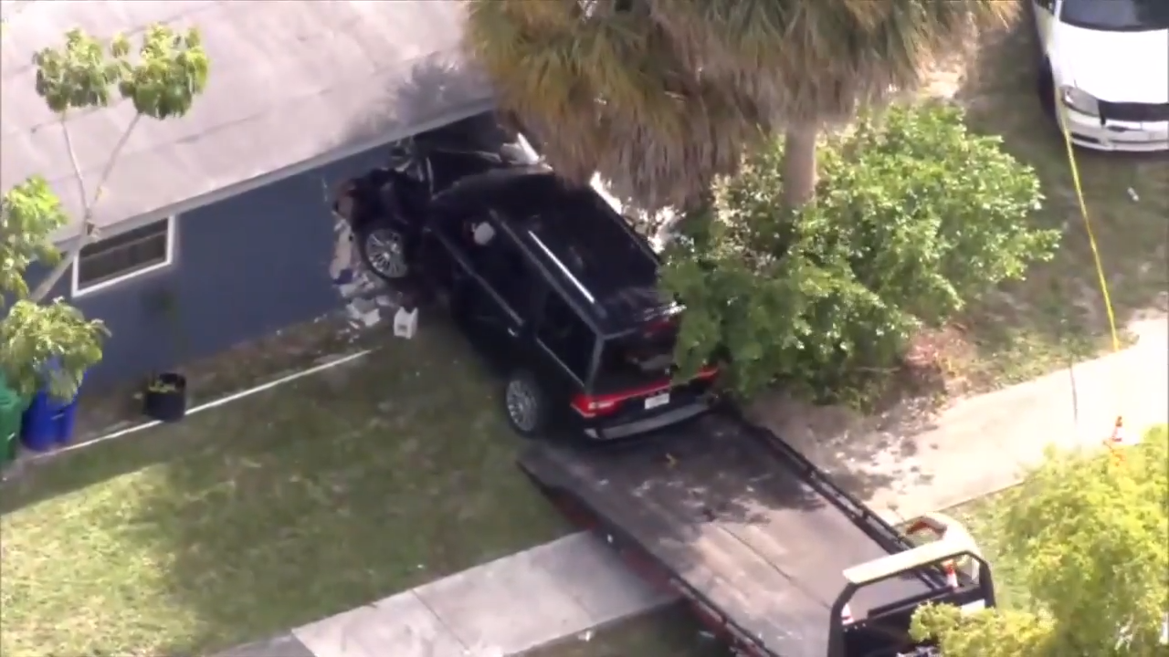 Driver hospitalized after car crashes into side of home near Fort ...