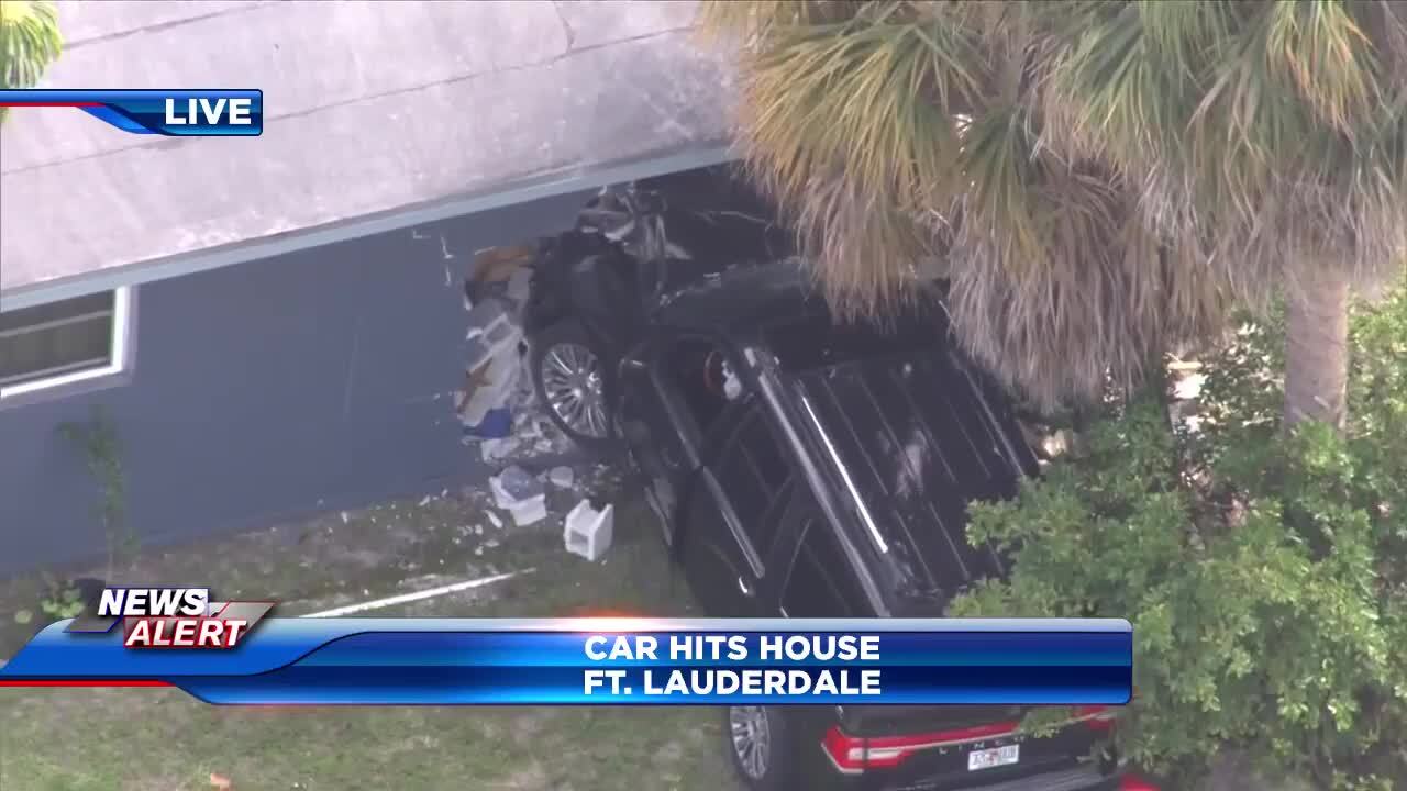 Driver hospitalized after car crashes into home near Fort Lauderdale