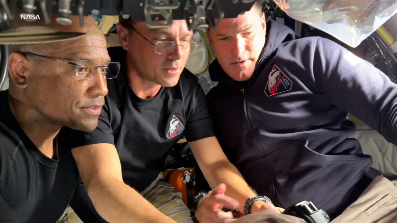 Artemis II astronauts make long-distance call to the space station as they head home from the moon