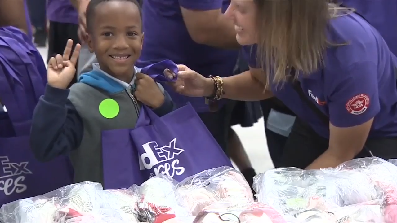 FedEx teams up with nonprofit Operation Warm to provide shoes and socks to students in North Miami