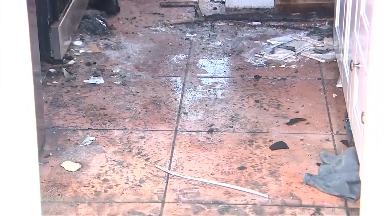 Fire crews pull trapped woman from apartment fire in Fort Lauderdale