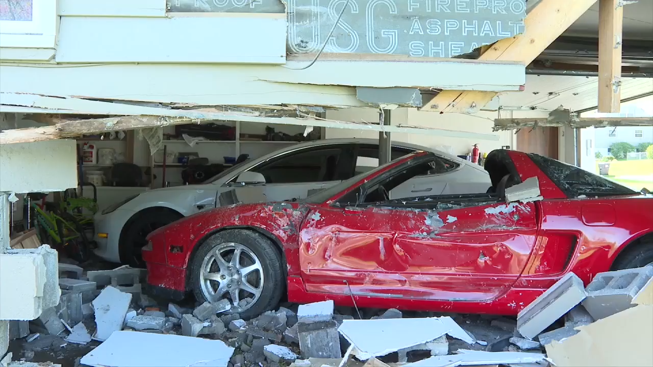 Truck crashes into home leaving rare car with extensive damage