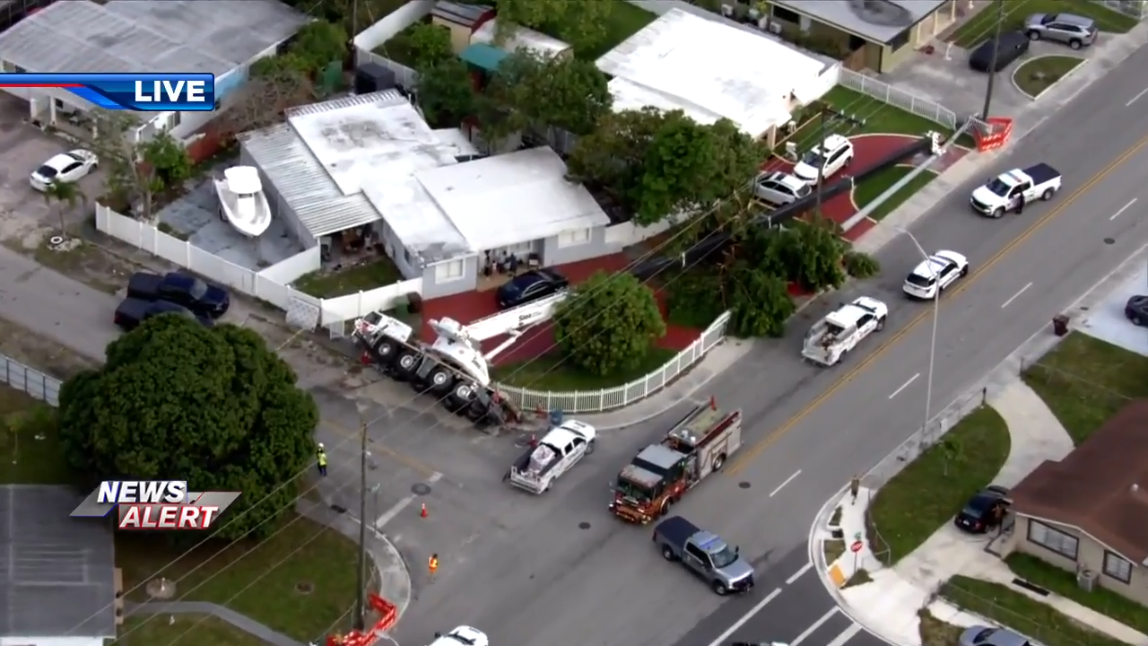 Crane falls over in front of 2 homes in Hialeah; no injuries reported