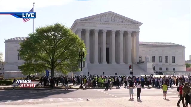 Supreme Court hears arguments over Trump’s bid to limit birthright citizenship as he attends