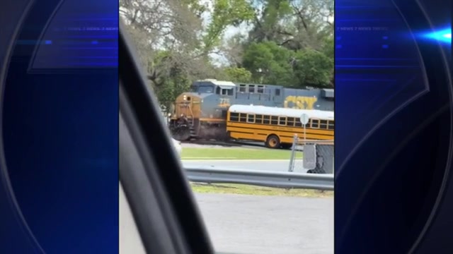‘Not gonna stop for no train’: Driver charged after train clips school bus with 29 children on board in Sumter County