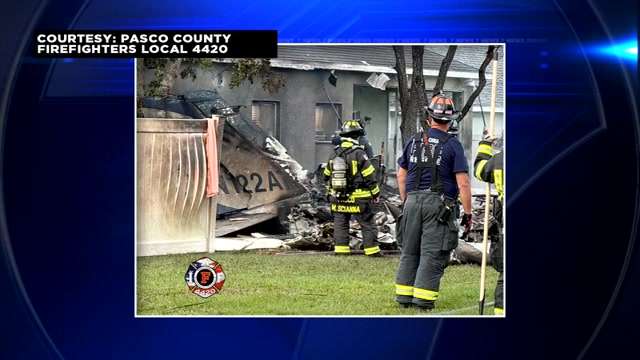 Pilot killed after small plane crashes between homes in Tampa-area ...