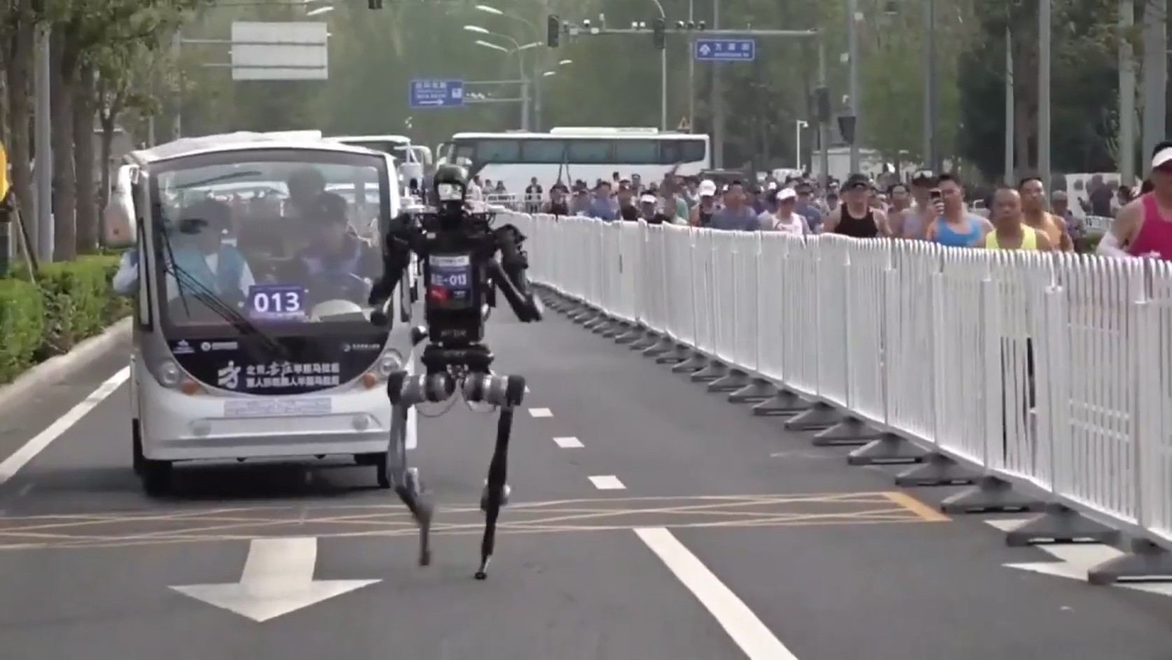 A humanoid robot sprints past the human half-marathon world record in Beijing race